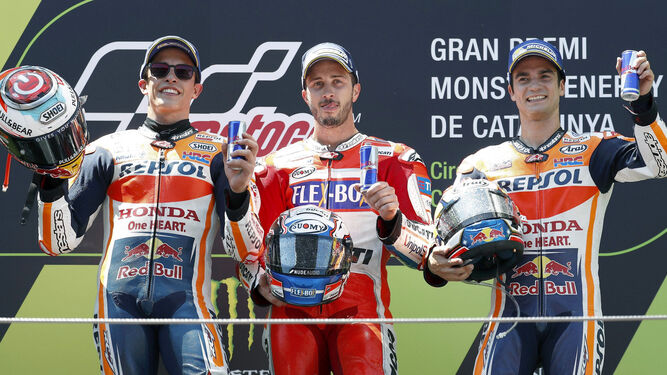 De izquierda a derecha, Márquez, Dovizioso y Pedrosa.