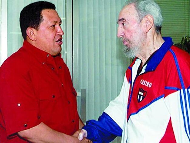 Hugo Ch&aacute;vez con Fidel Castro.

Foto: Efe/AFP/Reuters