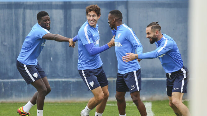 N'Diaye, Blanco Leschuk, Koné y Cifu, en el entrenamiento del Málaga CF.