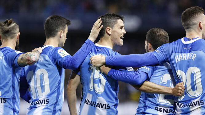 Los jugadores del Málaga celebran el 2-1 al Lugo.