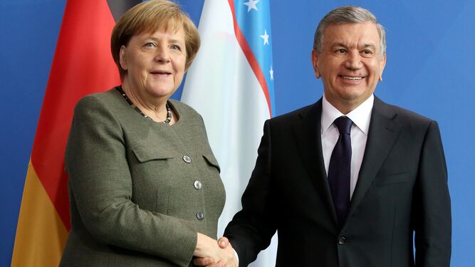 Merkel y Macron, tras la firma del tratado.