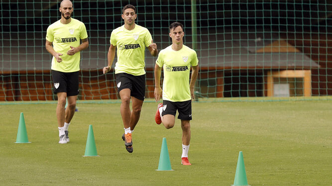 Mikel, Cecchini y Juanpi Añor, entrenándose.