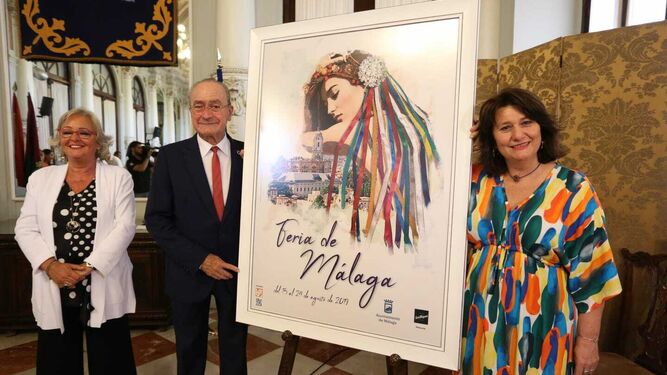 Teresa Porras, Francisco de la Torre y Adelfa Calvo junto al cartel de Feria 2019