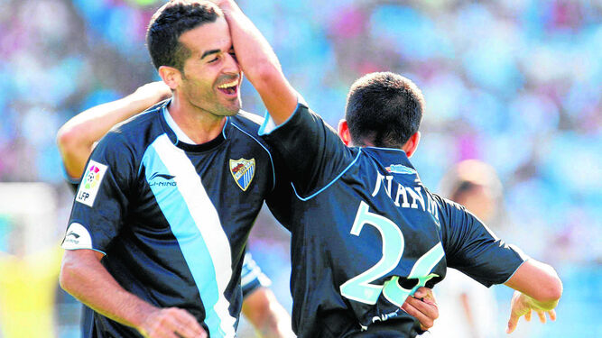 Fernando y Juanmi celebran un gol al Zaragoza en 2010.