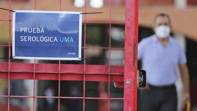 Cartel de la prueba en el Polideportivo Universitario de la UMA.