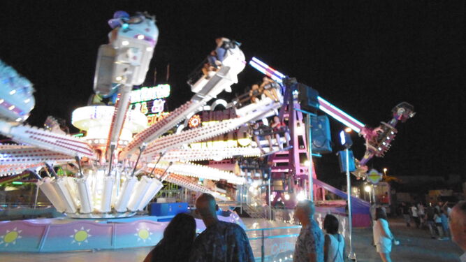 Imagen de archivo de una atracción en la Feria de Agosto, en Málaga.