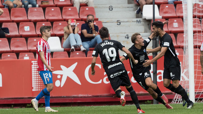 Juande, Paulino y Jozabed tras el 0-1 en Gijón.