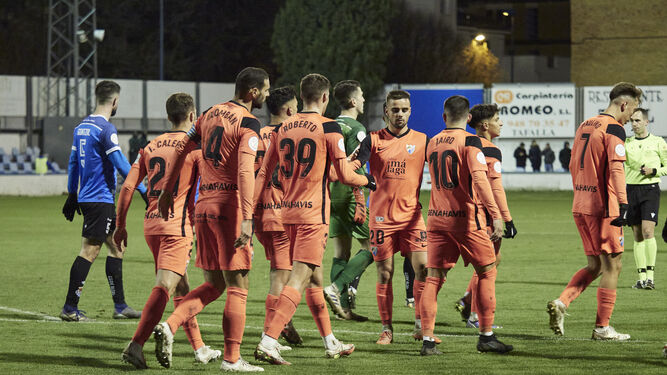 El Málaga celebra el 0-2.