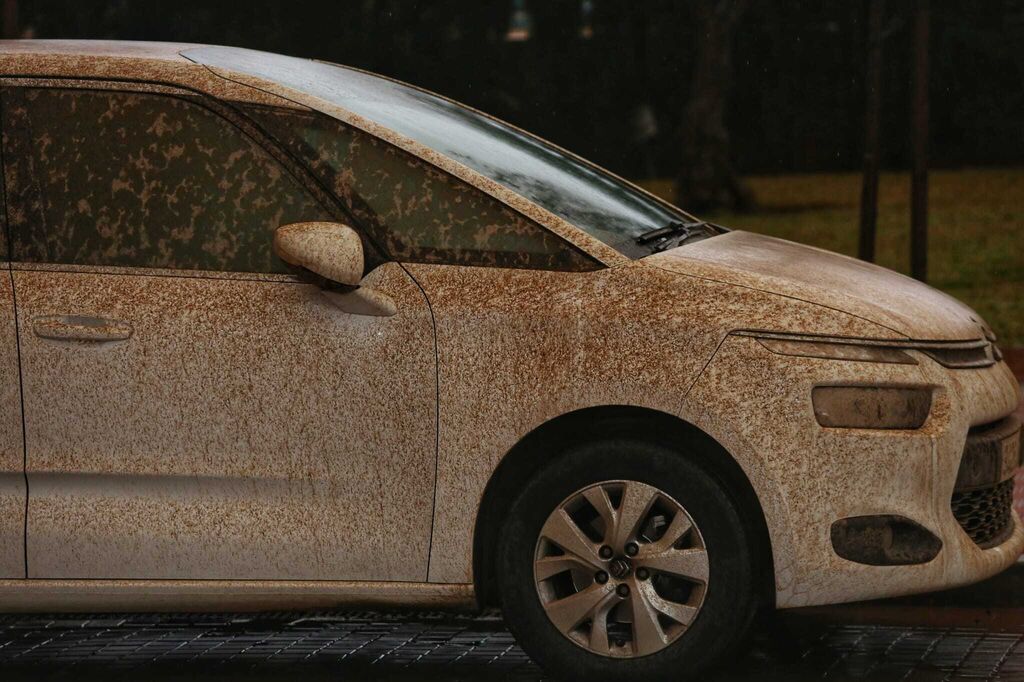 Fotos: La calima que no cesa: dep&oacute;sitos de barro en coches, calles y edificios