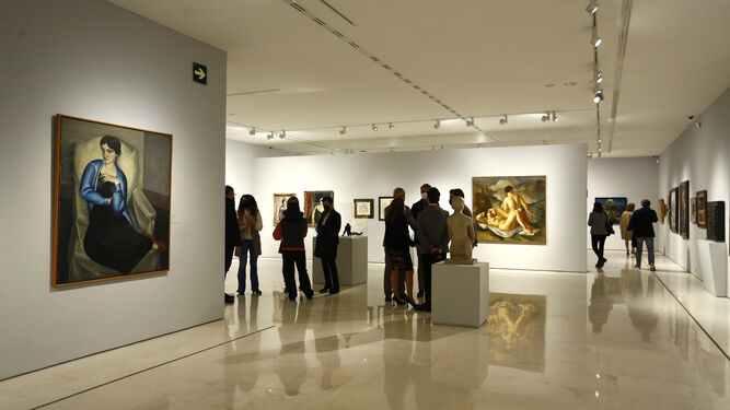 En primer término la obra 'Retrato de Rosa Chacel' de la exposición 'Real(ismos)' en el Museo Carmen Thyssen Málaga.