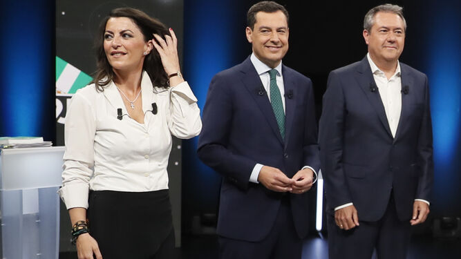 Macarena Olona , en el debate, junto a Juanma Moreno y Juan Espadas.
