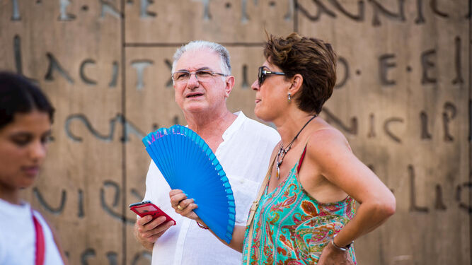 Una mujer con un abanico este miércoles en Málaga.