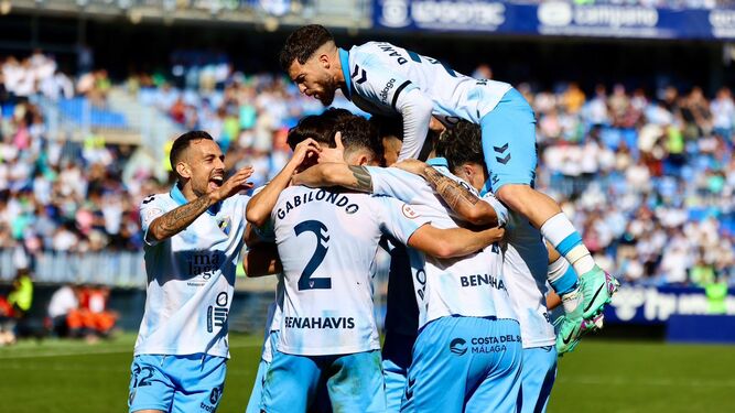Celebración de los jugadores del Málaga CF ante el Atlético Baleares