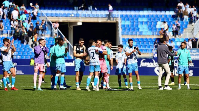 El Málaga CF celebra tras el partido.