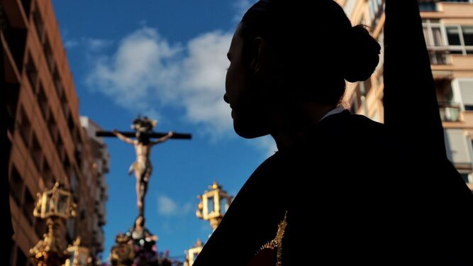 Amor y Caridad en su procesión del Viernes Santo en Málaga.